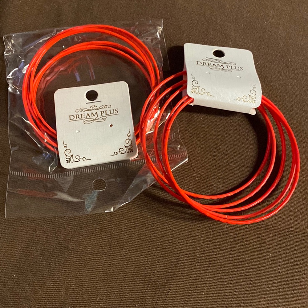 Dream Plus Neon Orange Bracelets.